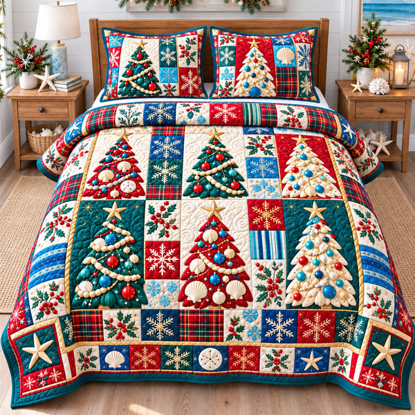 Coastal Christmas Tree Magic quilted bedding set, quilt and two pillow shams on a made bed