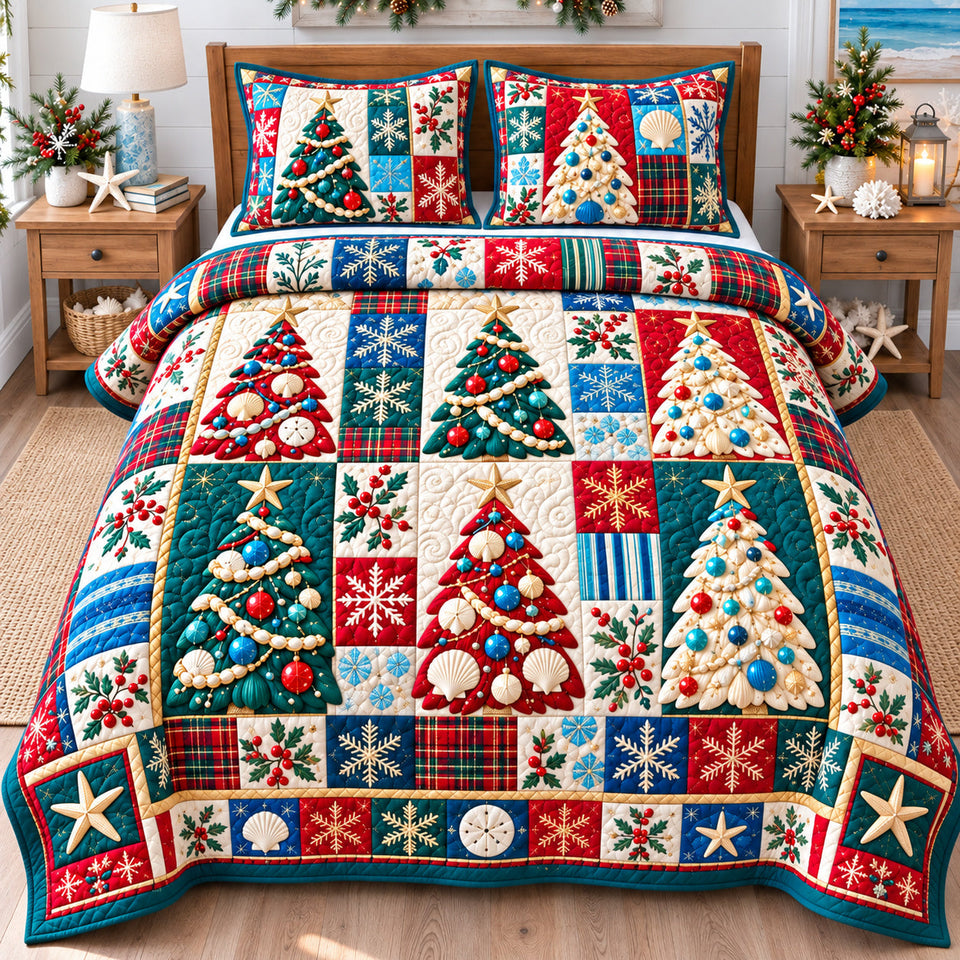 Coastal Christmas Tree Magic quilted bedding set, quilt and two pillow shams on a made bed