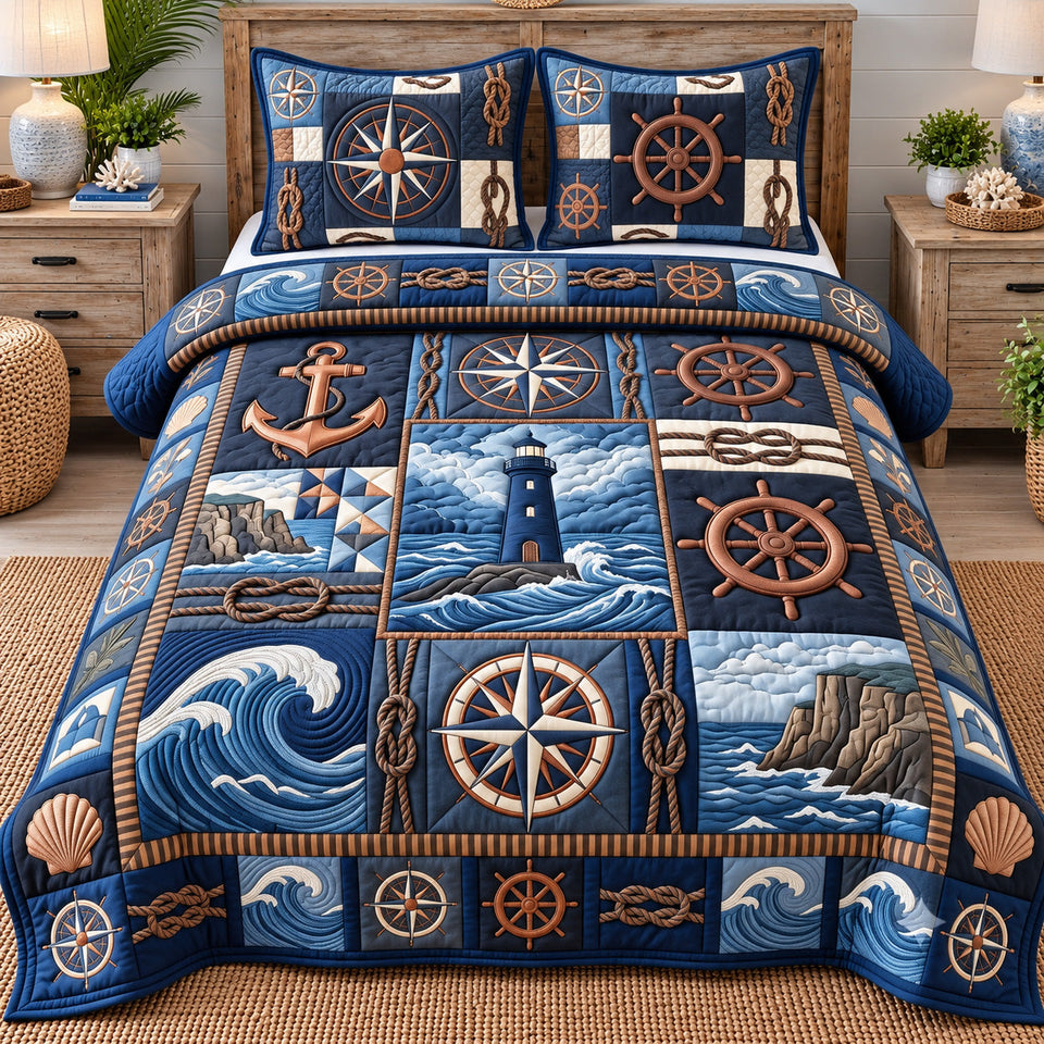 Coastal Patchwork Anchor quilted bedding set, quilt and two pillow shams on a made bed