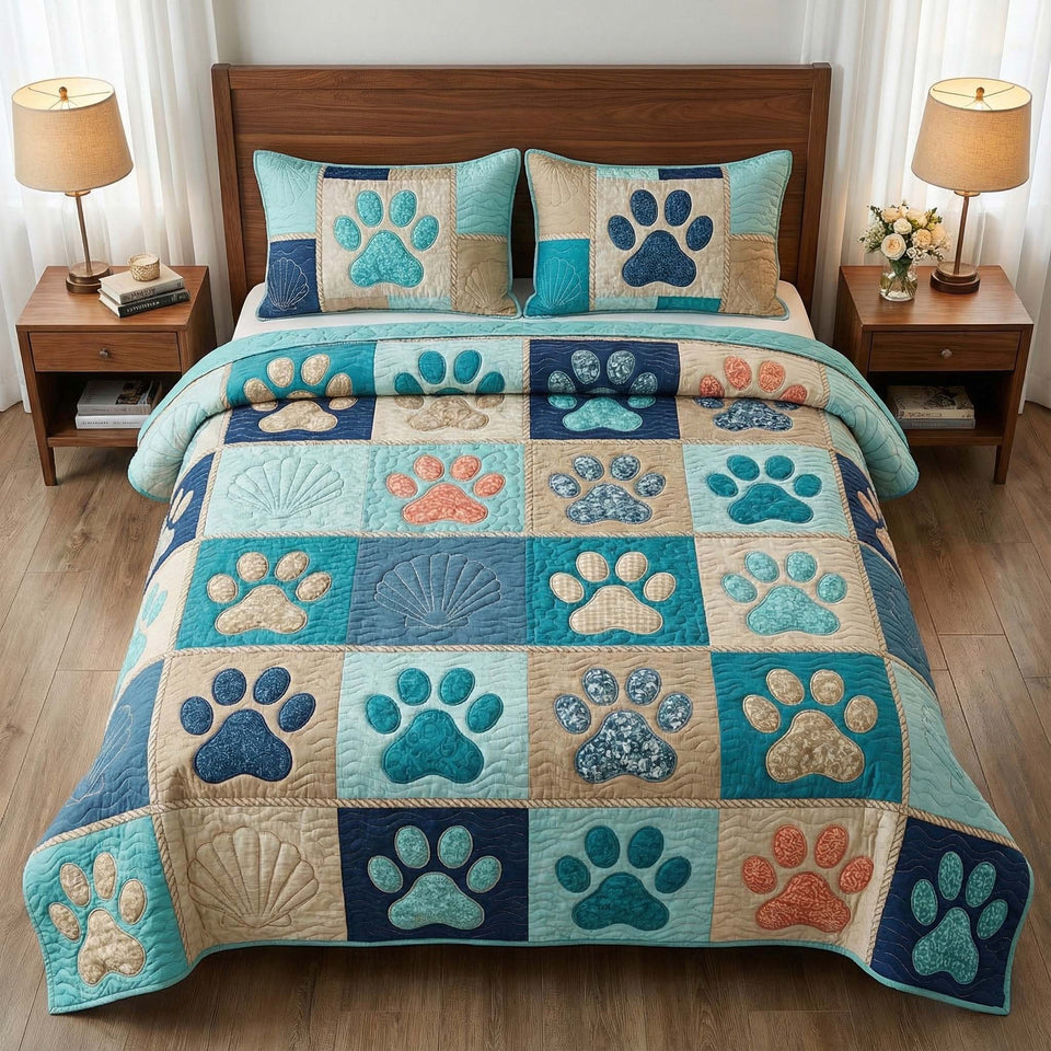 Coastal Paws quilted bedding set, quilt and two pillow shams on a made bed