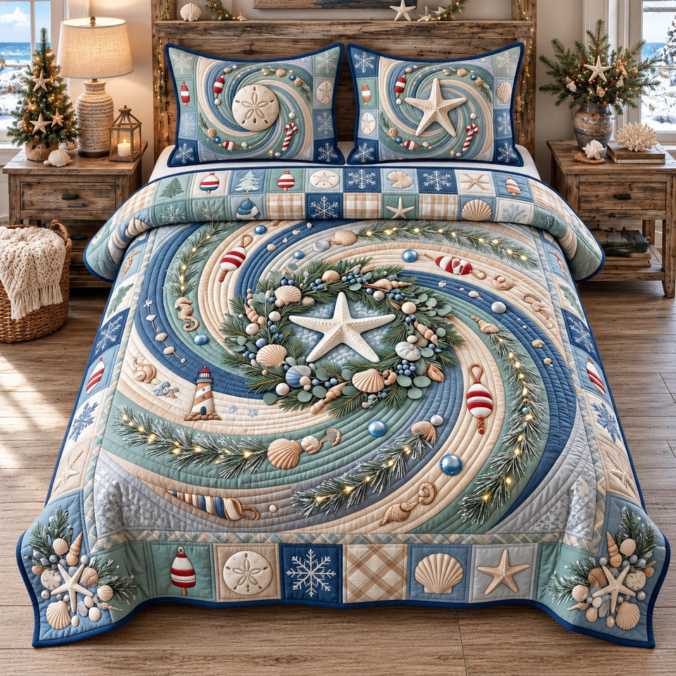 Coastal Seashell Wreath quilted bedding set, quilt and two pillow shams on a made bed