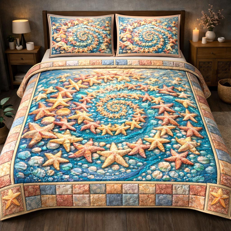 Coastal Treasure Starfish Spiral On Deep Blue quilted bedding set, quilt and two pillow shams on a made bed