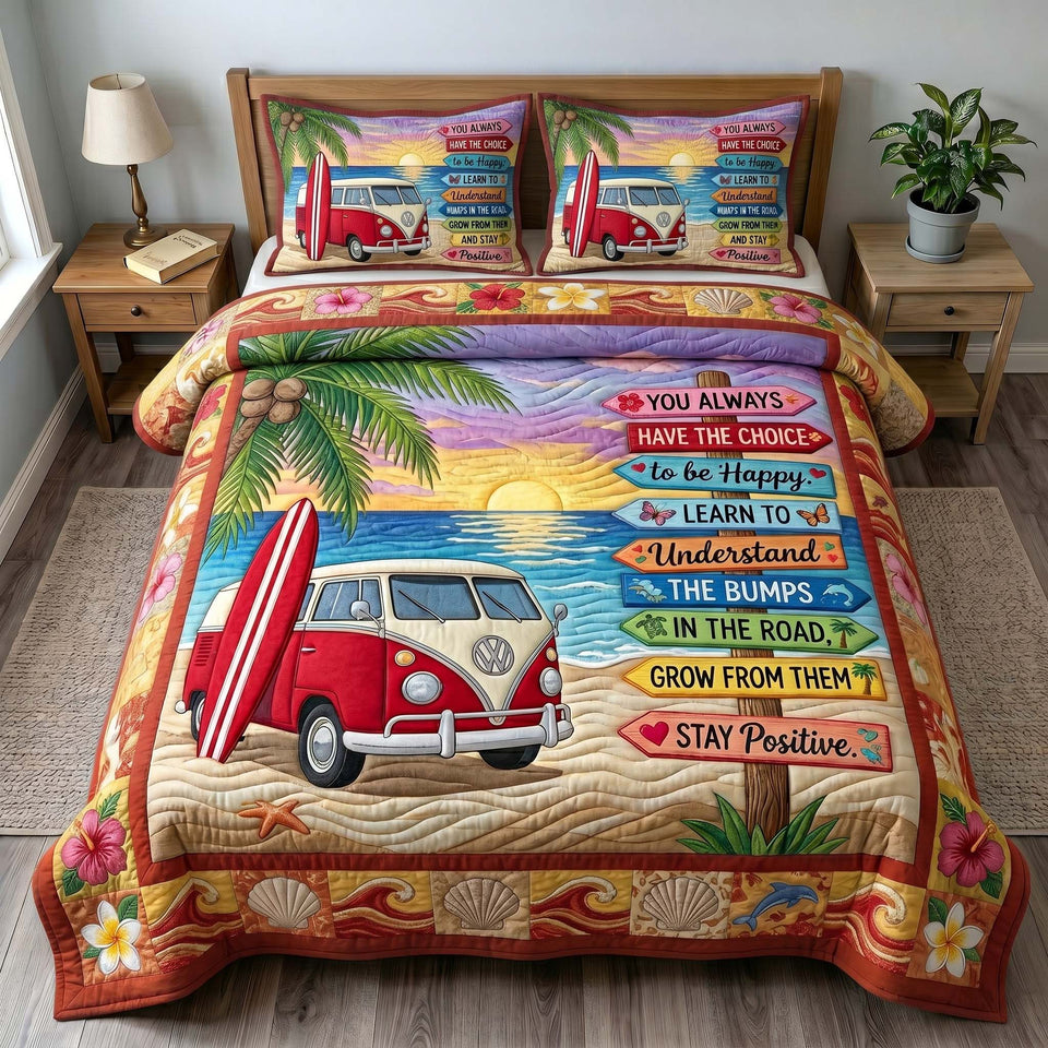 Coastal Wanderer quilted bedding set, quilt and two pillow shams on a made bed