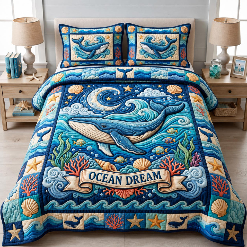 Coastal Whisper Coastal Living quilted bedding set, quilt and two pillow shams on a made bed