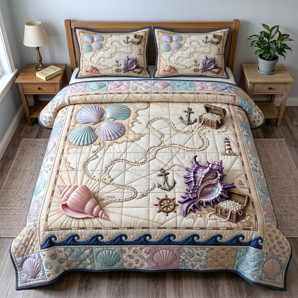 Coastal Whisper Treasure Map and Conch quilted bedding set, quilt and two pillow shams on a made bed