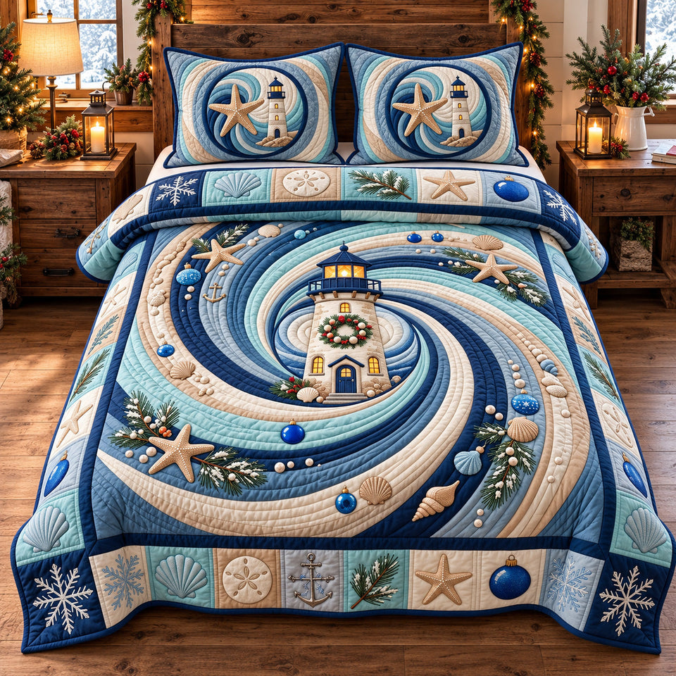 Coastal Winter Lighthouse quilted bedding set, quilt and two pillow shams on a made bed