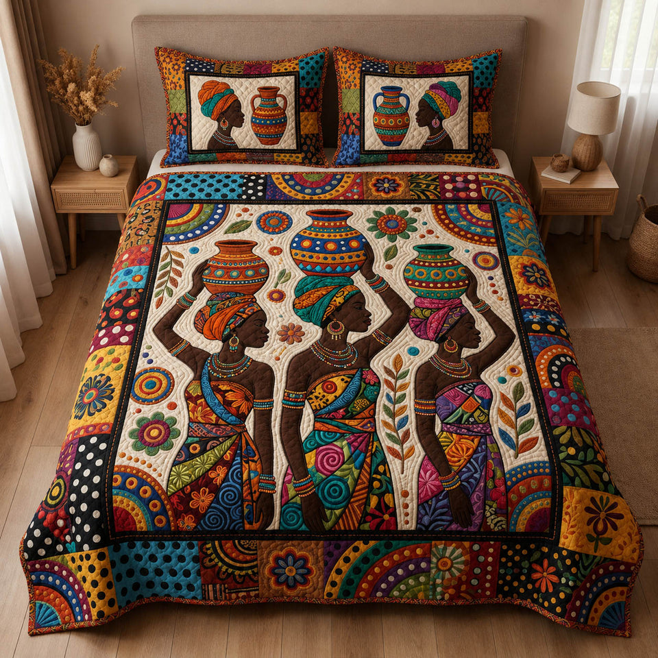 Color Harmony quilted bedding set, quilt and two pillow shams on a made bed