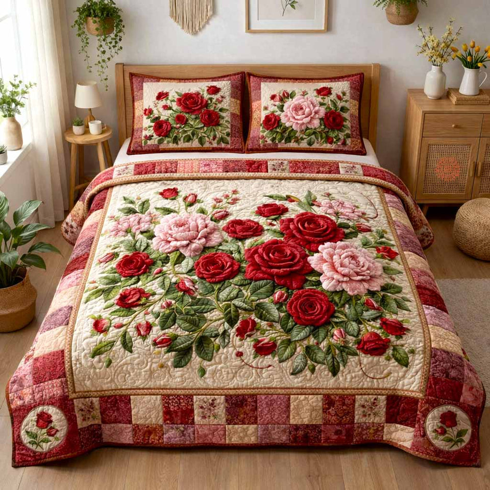 Cottage Bloom Red Rose Bouquet quilted bedding set, quilt and two pillow shams on a made bed