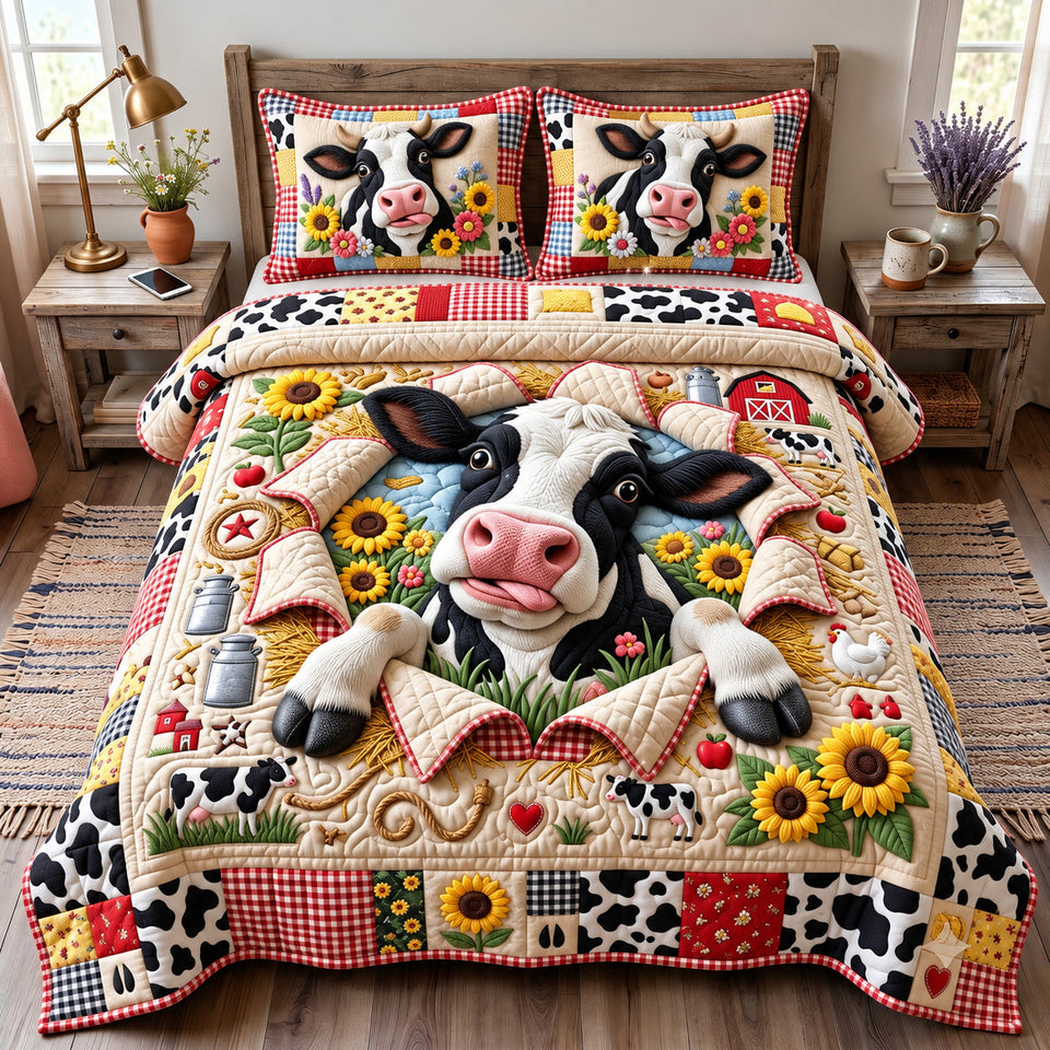 Cute Cow quilted bedding set, quilt and two pillow shams on a made bed
