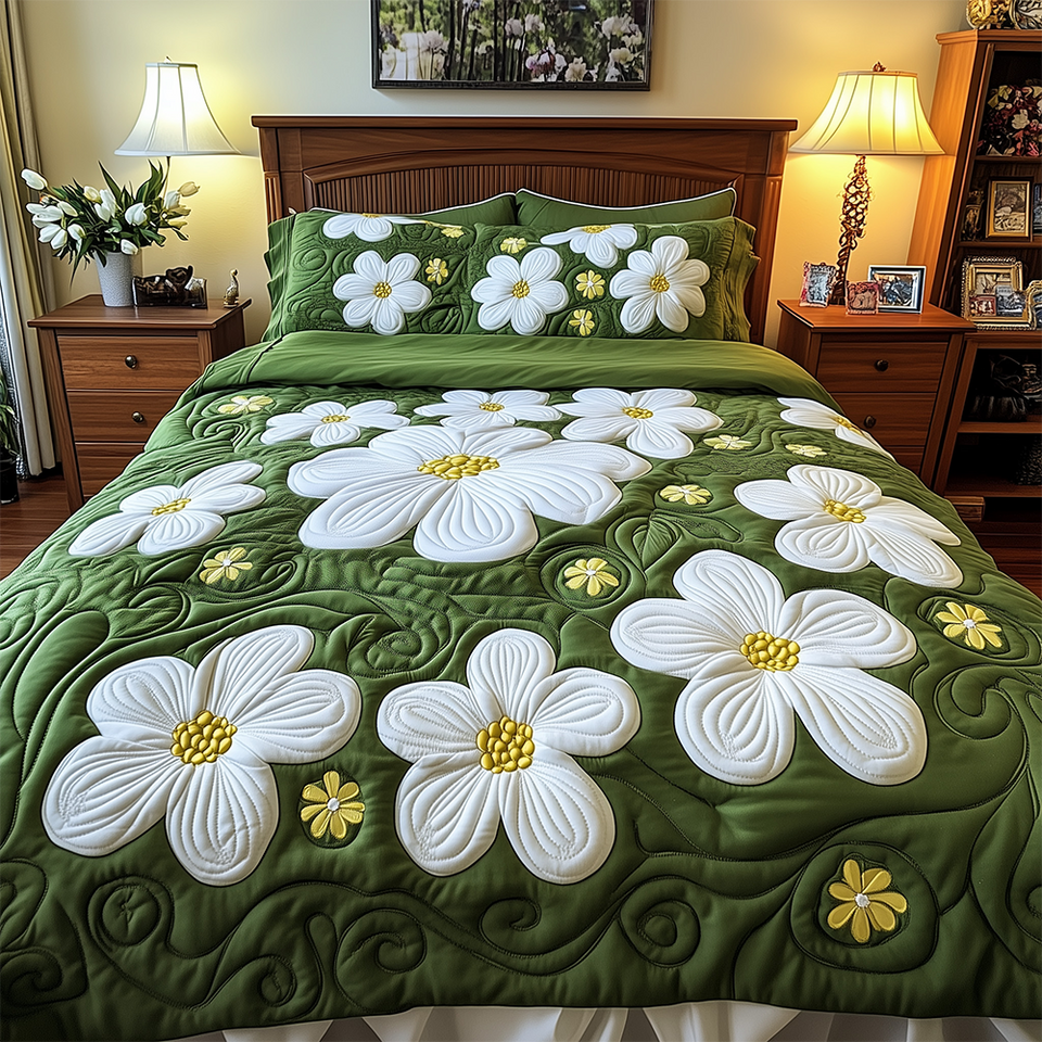 Daisy Garden White Petals Moss Green quilted bedding set, quilt and two pillow shams on a made bed