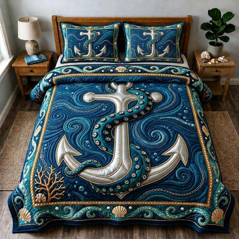 Deep Sea Anchor quilted bedding set, quilt and two pillow shams on a made bed