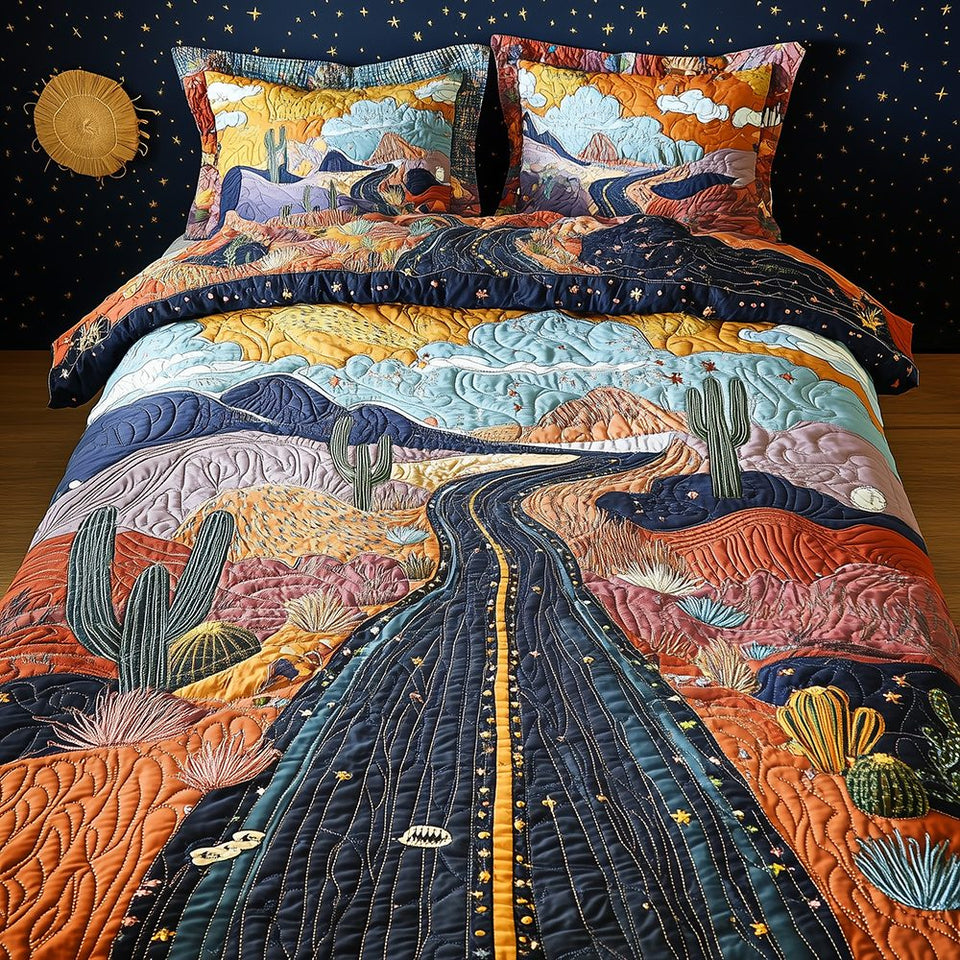 Desert Highway Night Lane Amber Cliffs 3-Piece Quilted Bedding Set quilted 3-piece bedding set on a made bed with two matching pillow shams