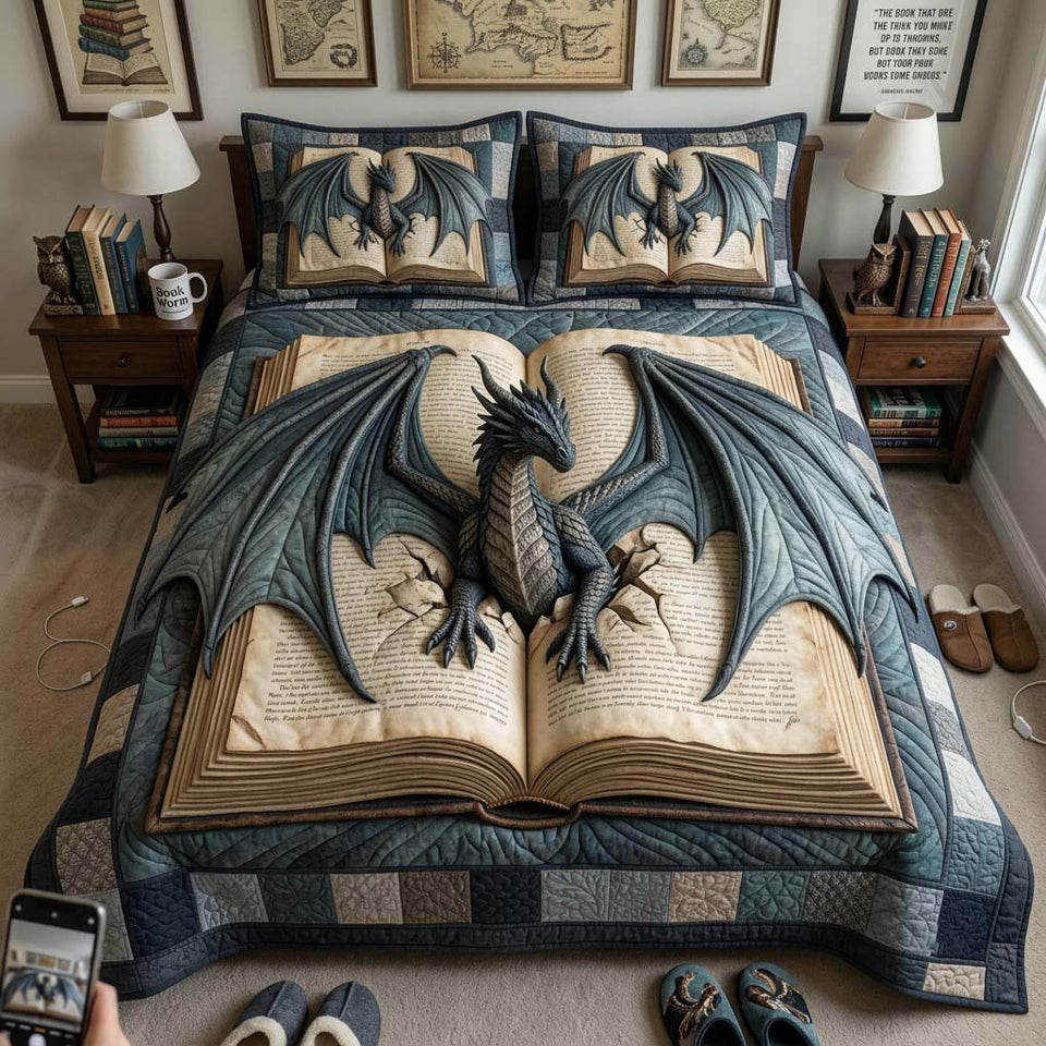 Dragon Over the Open Tome quilted bedding set, quilt and two pillow shams on a made bed