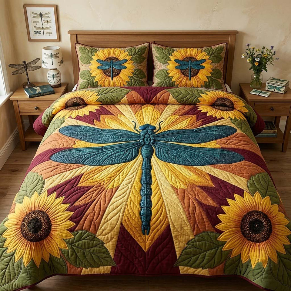 Dragonfly among the Sunflowers quilted bedding set, quilt and two pillow shams on a made bed