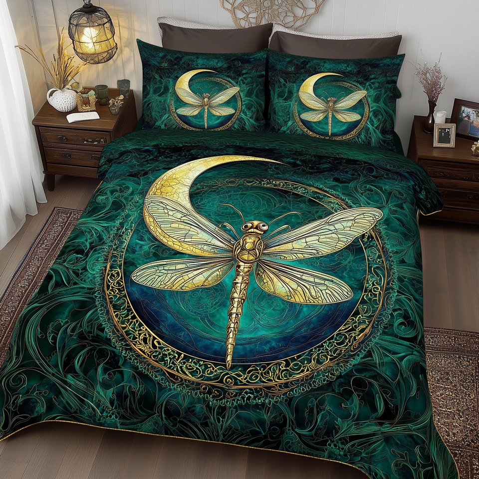 Dragonfly Mandala Ringed Medallion Crescent quilted bedding set, quilt and two pillow shams on a made bed