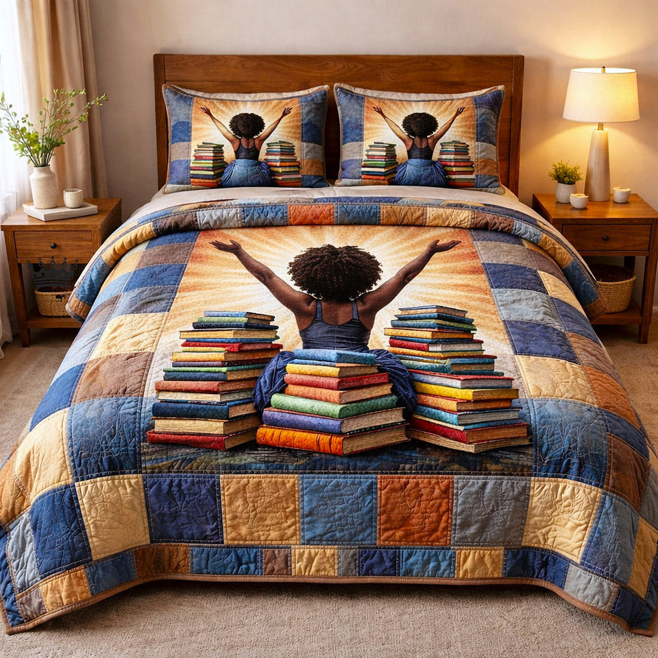 Ebony Glow Child Atop A Book Stack Blue Squares quilted bedding set, quilt and two pillow shams on a made bed