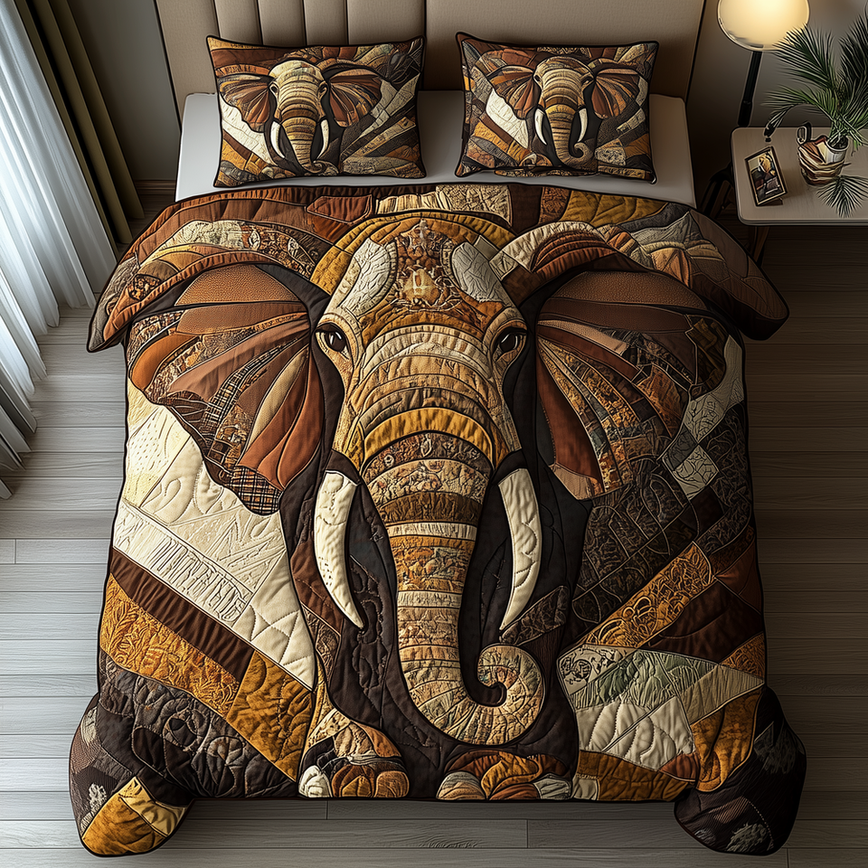 Elephant Whisper quilted bedding set, quilt and two pillow shams on a made bed
