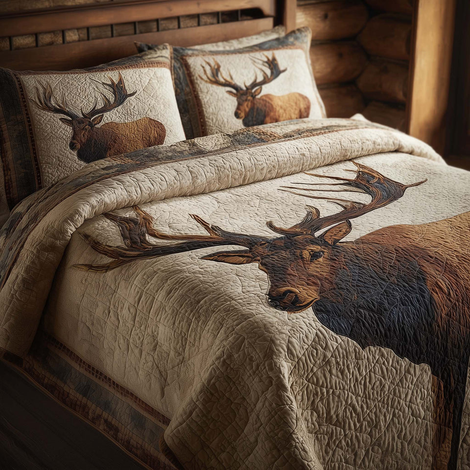 Elk Portrait quilted bedding set, quilt and two pillow shams on a made bed