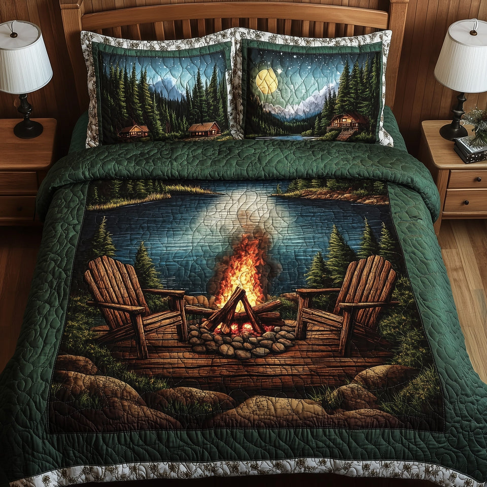 Ember Glow Mountain Lake quilted bedding set, quilt and two pillow shams on a made bed