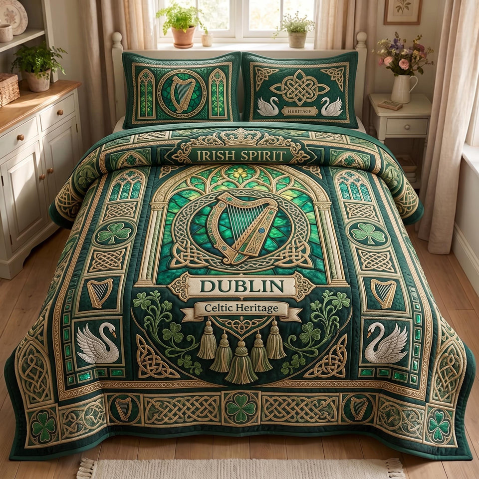 Emerald Isle quilted bedding set, quilt and two pillow shams on a made bed