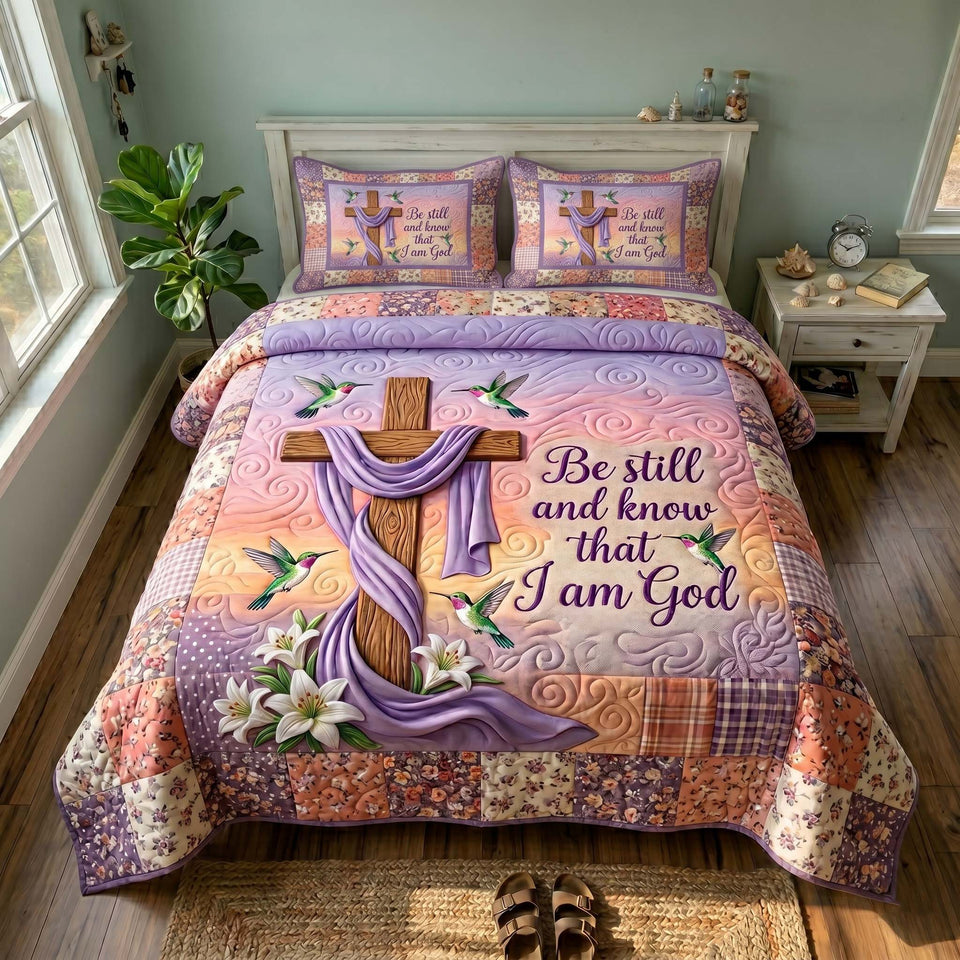 Faith Blossoms Wooden Cross And White Lilies On Peach quilted bedding set, quilt and two pillow shams on a made bed