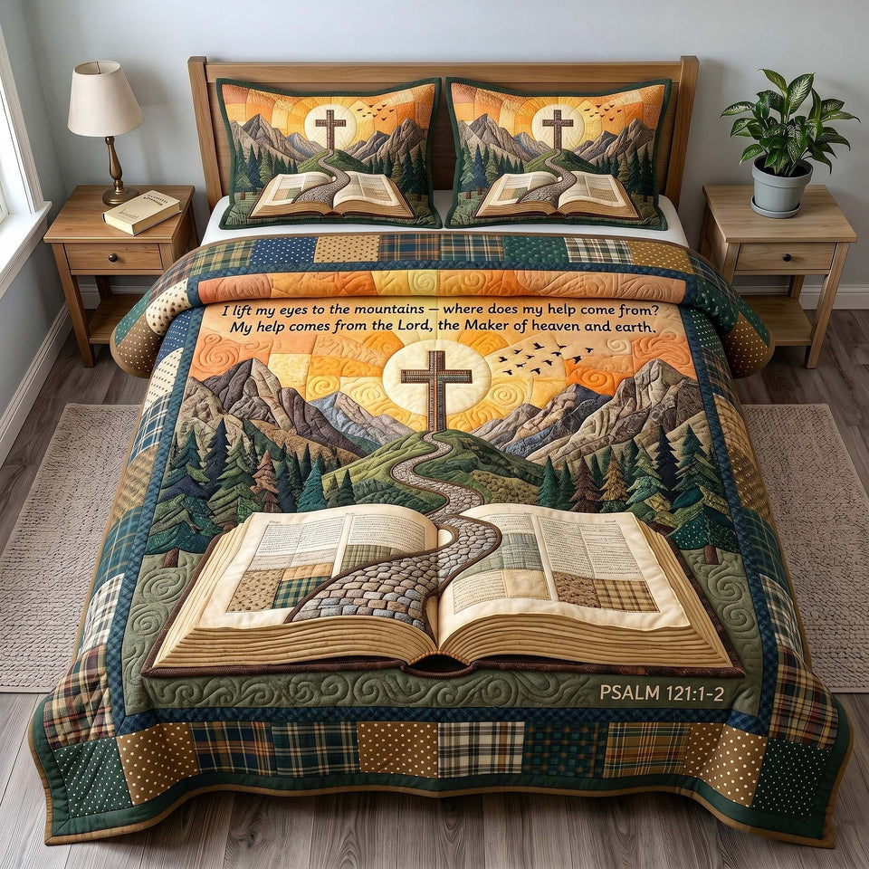 Faithful Forest Mountain Path Cross quilted bedding set, quilt and two pillow shams on a made bed