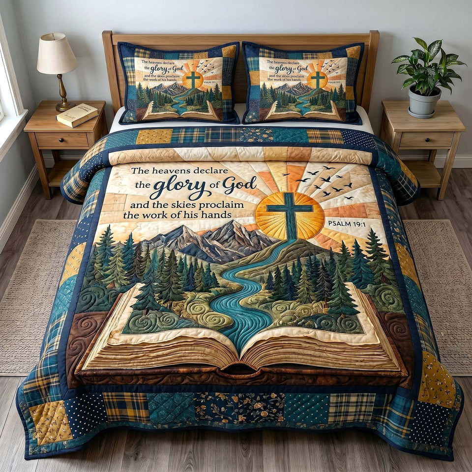 Faithful Forest Teal Patchwork Sunrise quilted bedding set, quilt and two pillow shams on a made bed