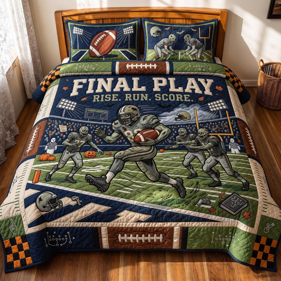 Final Play quilted bedding set, quilt and two pillow shams on a made bed