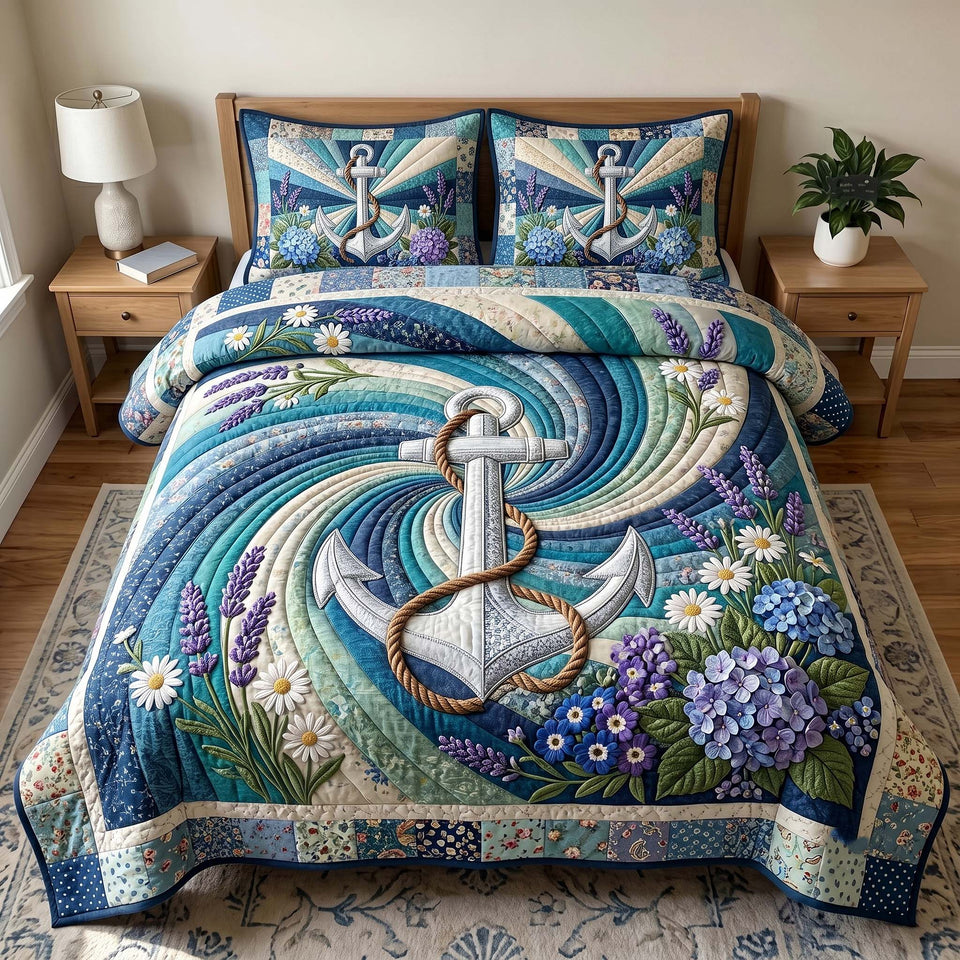 Floral Anchor Teal Wave Swirl quilted bedding set, quilt and two pillow shams on a made bed