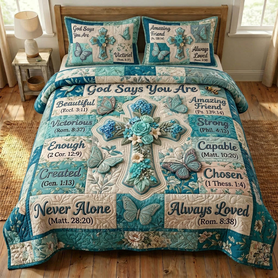 Floral Bible Turquoise Grid Cross quilted bedding set, quilt and two pillow shams on a made bed