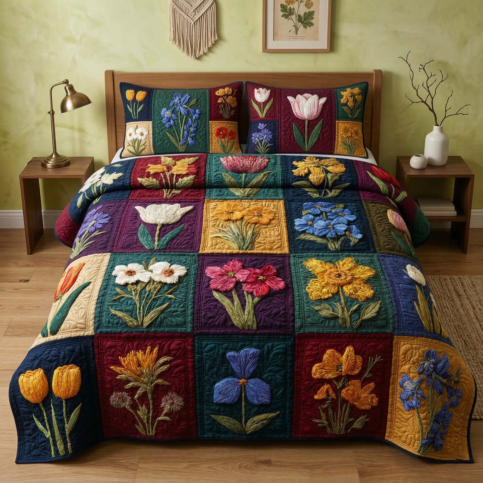 Floral Patchwork Jewel Tone Botanicals quilted bedding set, quilt and two pillow shams on a made bed