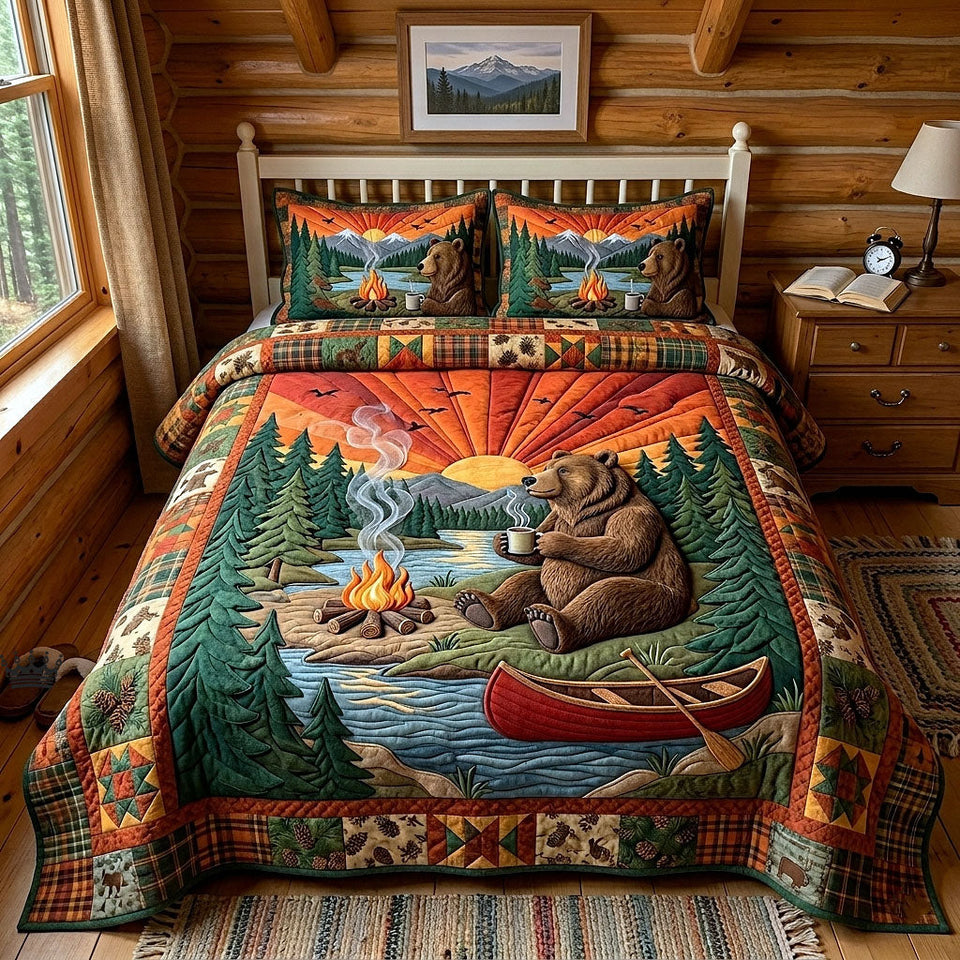 Forest Camper Canoe on the Sunset Lake quilted bedding set, quilt and two pillow shams on a made bed