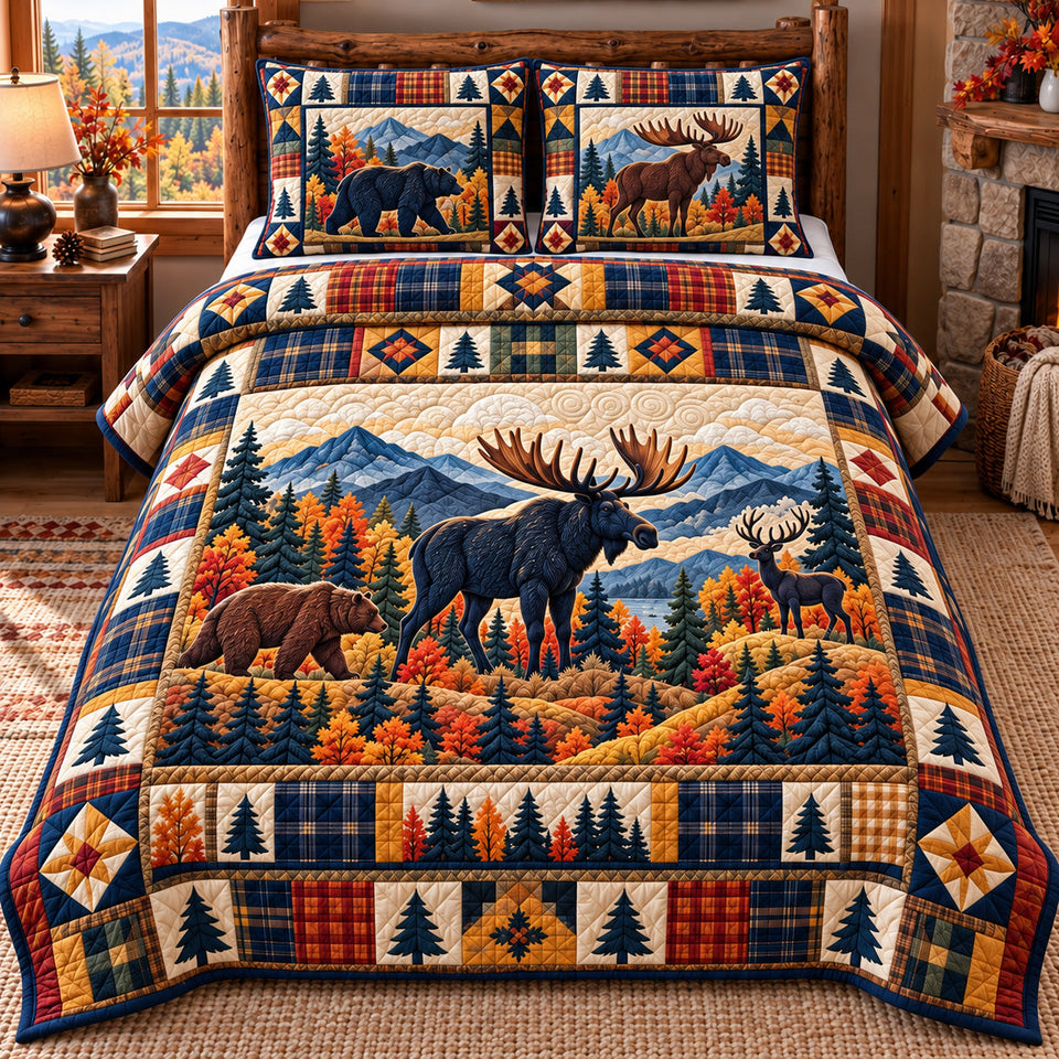 Forest Patchwork in Black quilted bedding set, quilt and two pillow shams on a made bed
