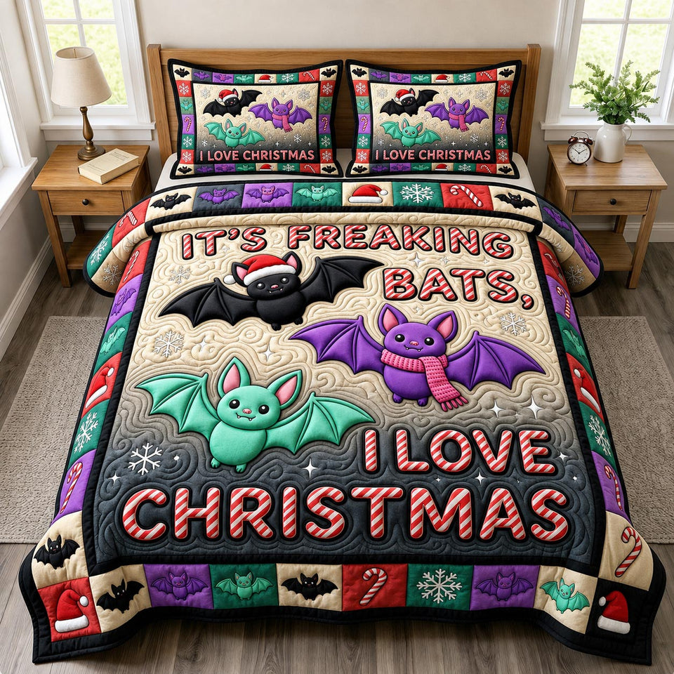 Freaking Bats Christmas Cheer quilted bedding set, quilt and two pillow shams on a made bed