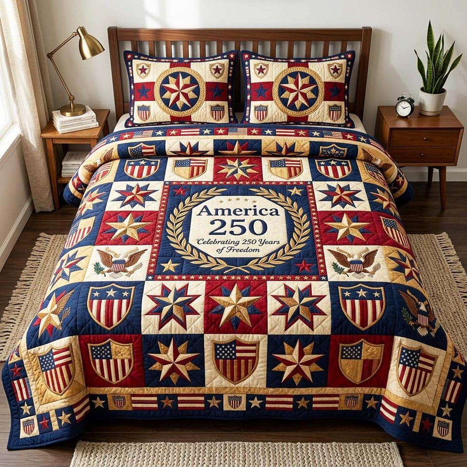 Freedom Crest quilted bedding set, quilt and two pillow shams on a made bed
