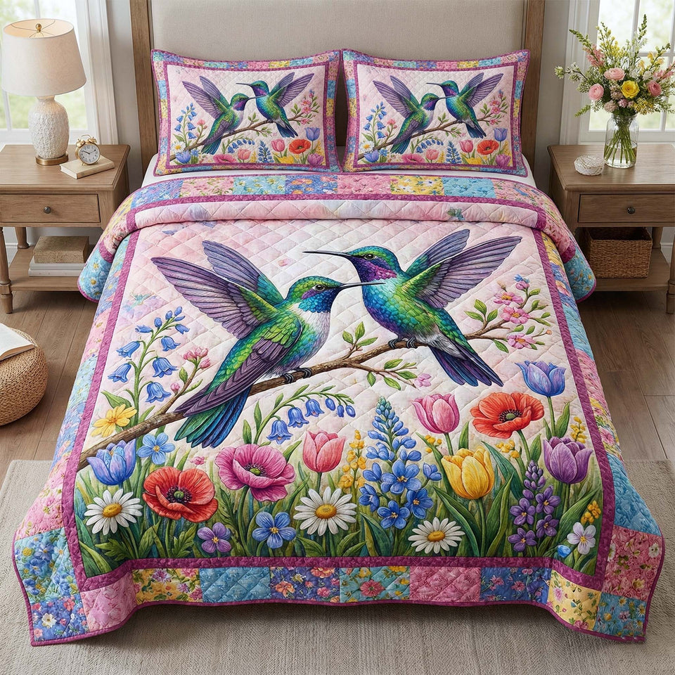 Garden Sprite Pink Border Tulip Pair quilted bedding set, quilt and two pillow shams on a made bed