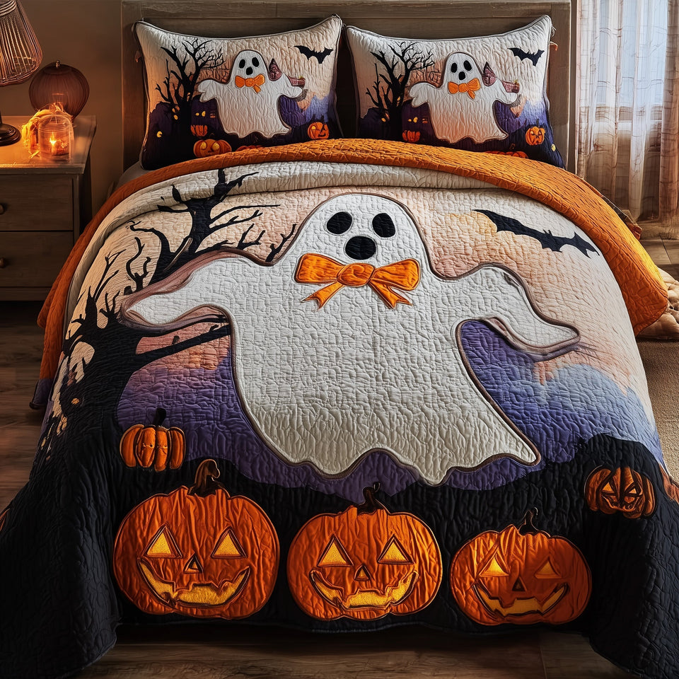 Ghostly Giggles Orange Bow Tie Grin quilted bedding set, quilt and two pillow shams on a made bed