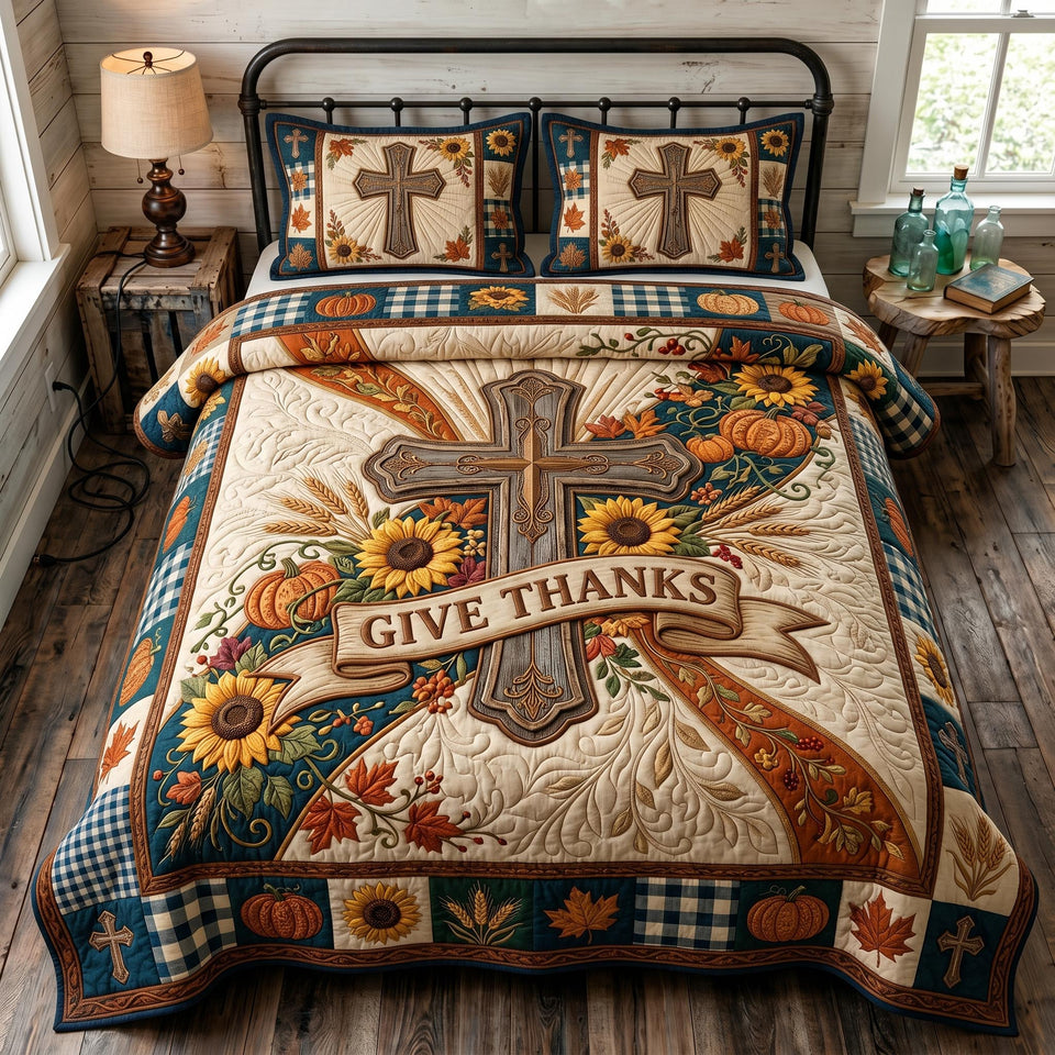 Give Thanks Cross Banner quilted bedding set, quilt and two pillow shams on a made bed