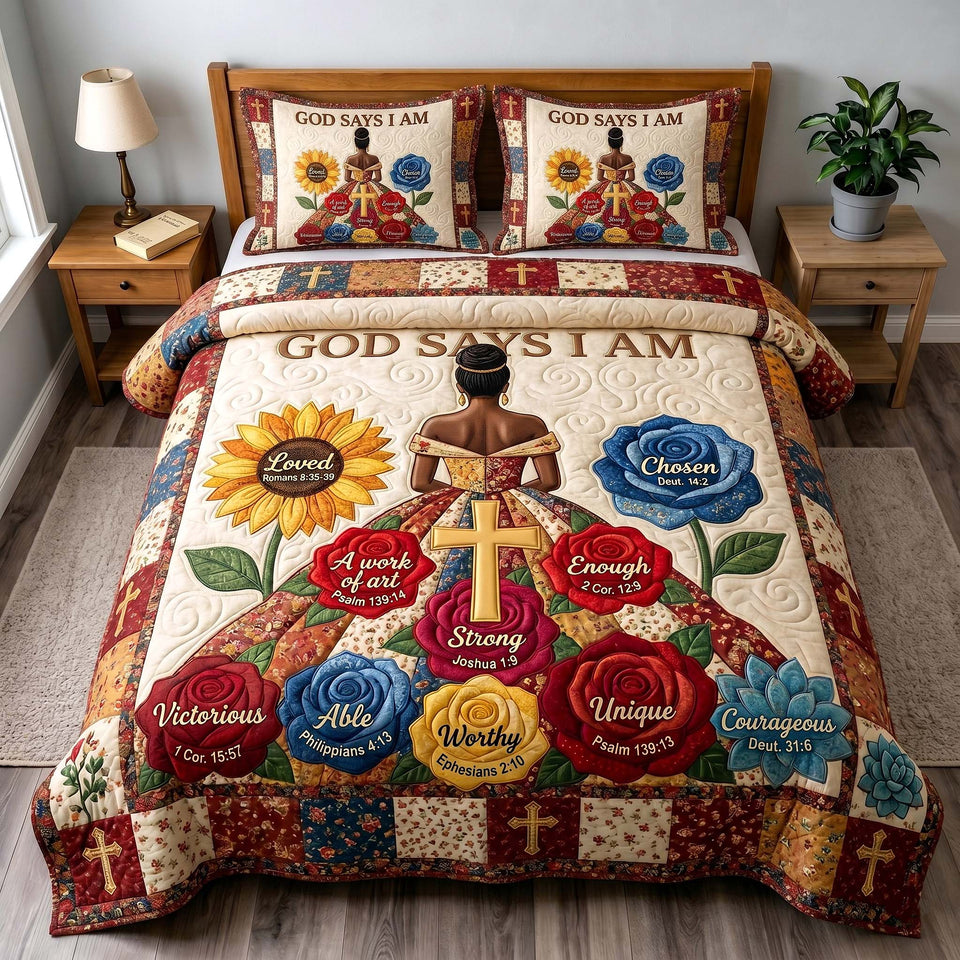 God Says I Am Roses quilted bedding set, quilt and two pillow shams on a made bed