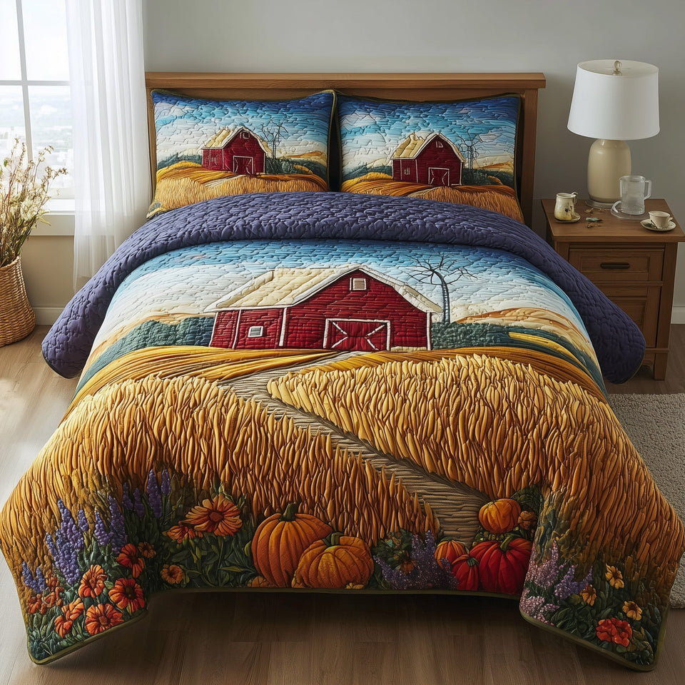 Golden Fields Red Barn Pumpkin Harvest quilted bedding set, quilt and two pillow shams on a made bed