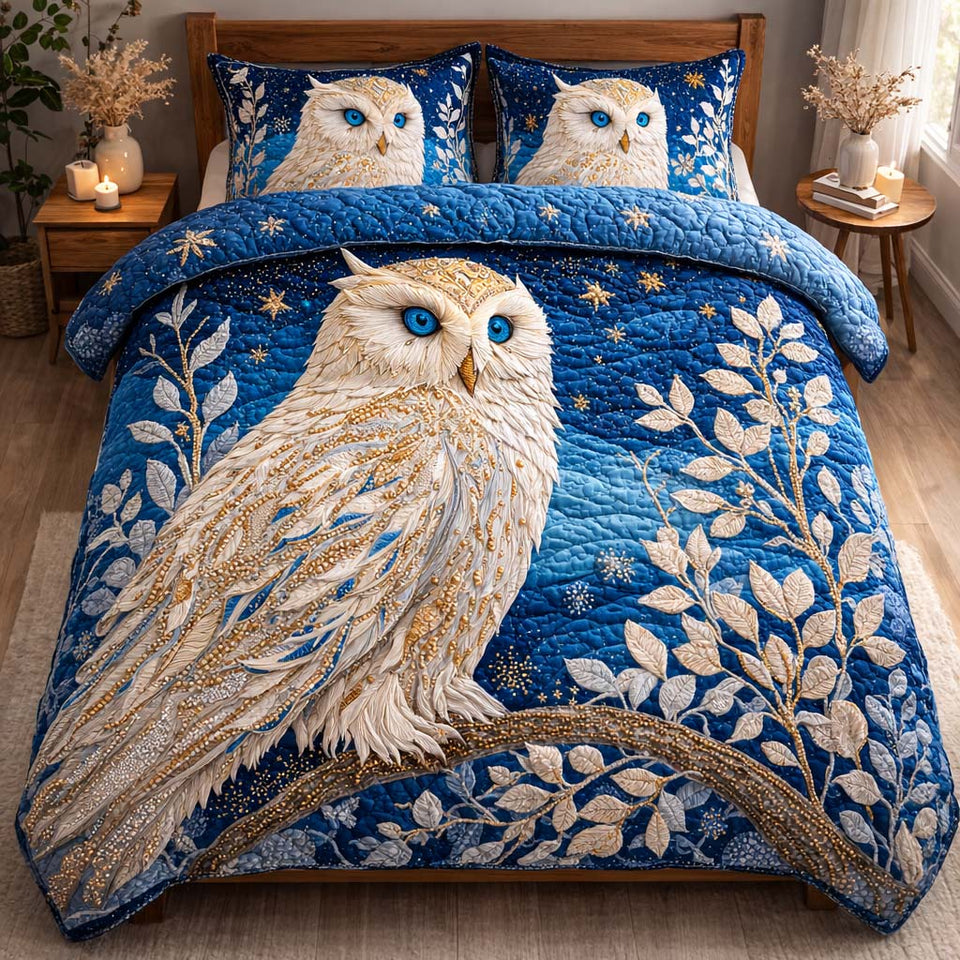 Golden Night Owl quilted bedding set, quilt and two pillow shams on a made bed