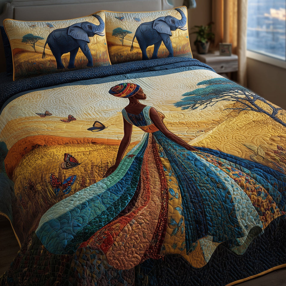 Golden Queens Savannah Elephant Gown quilted bedding set, quilt and two pillow shams on a made bed