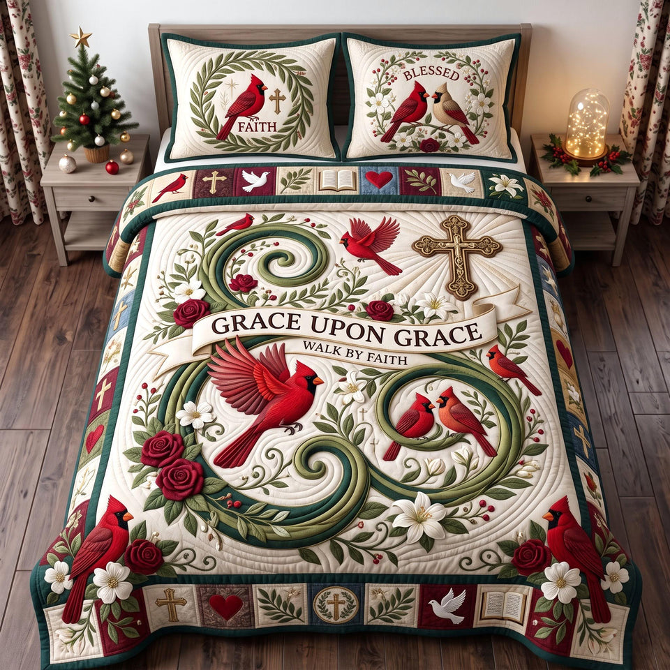 Grace Upon Grace Cardinal Scroll quilted bedding set, quilt and two pillow shams on a made bed