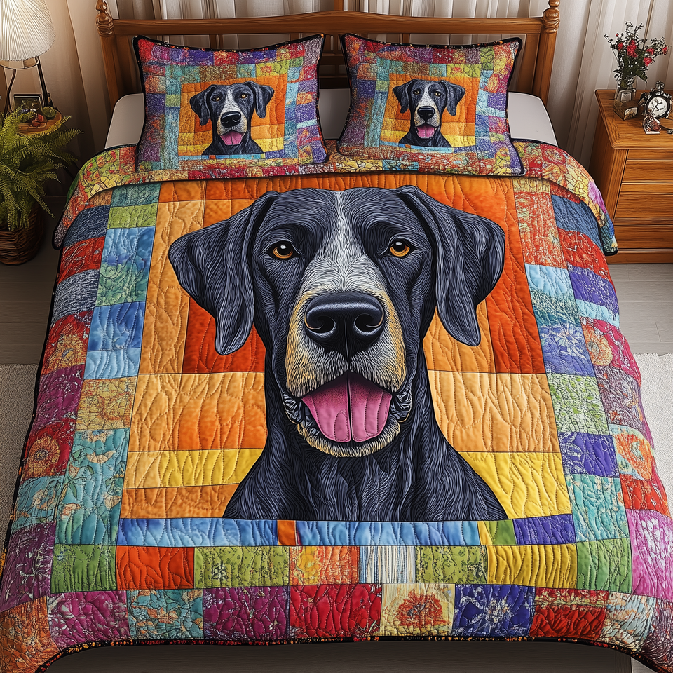 Great Dane quilted bedding set, quilt and two pillow shams on a made bed