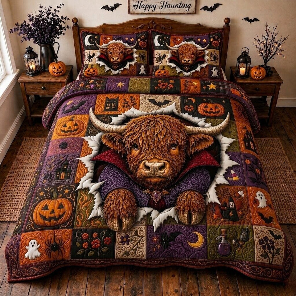 Halloween Cow quilted bedding set, quilt and two pillow shams on a made bed
