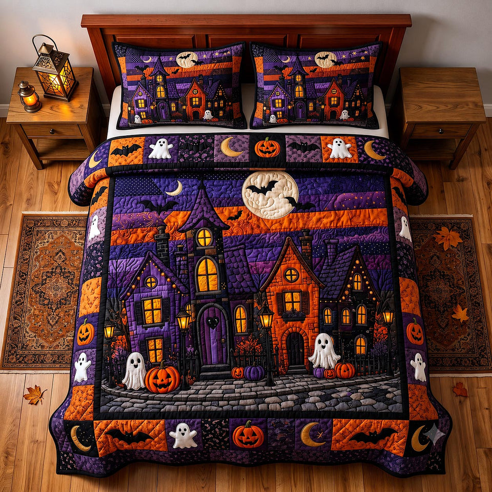 Halloween Lane quilted bedding set, quilt and two pillow shams on a made bed