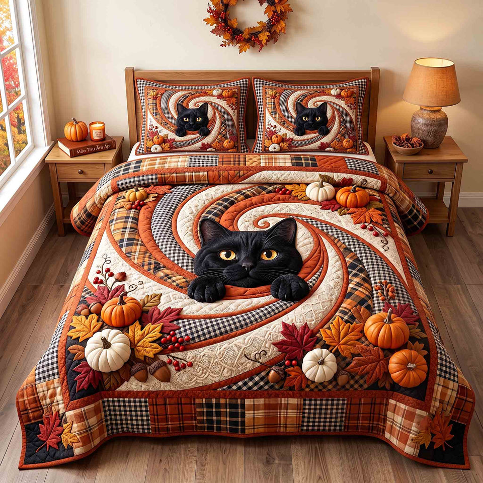 Harvest Swirl Cat quilted bedding set, quilt and two pillow shams on a made bed