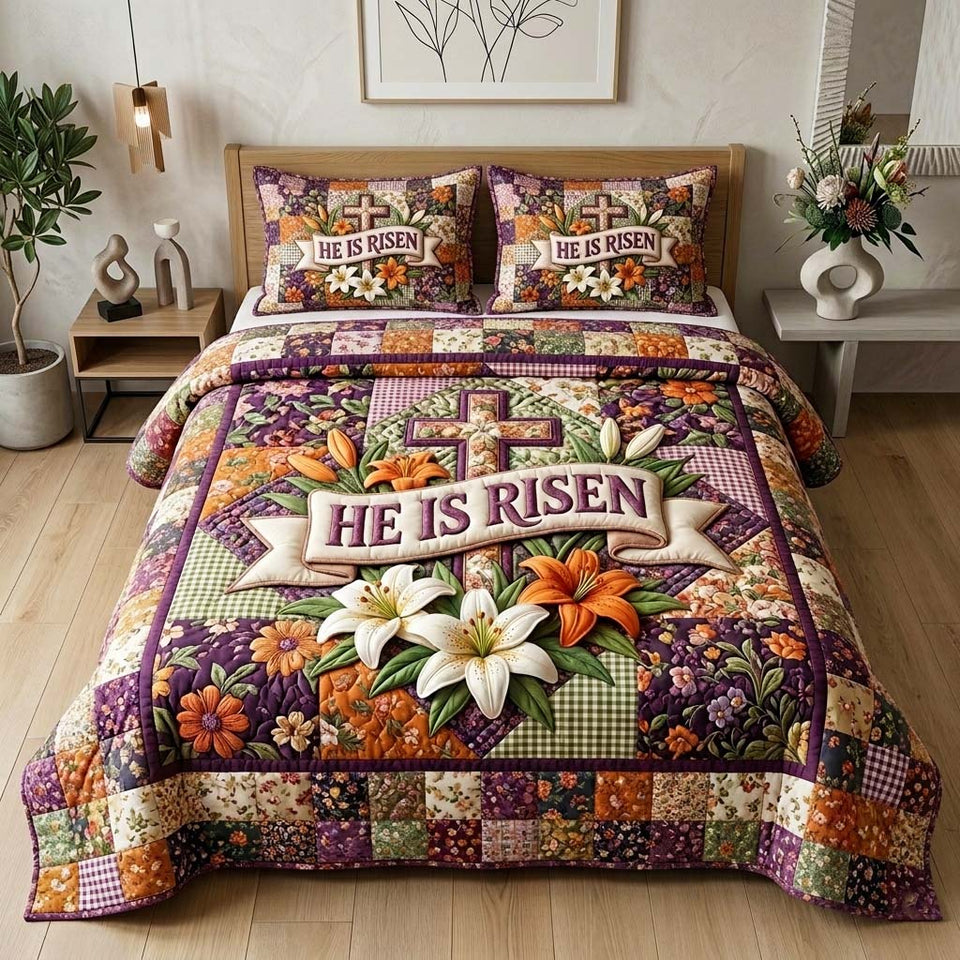 He Risen quilted bedding set, quilt and two pillow shams on a made bed