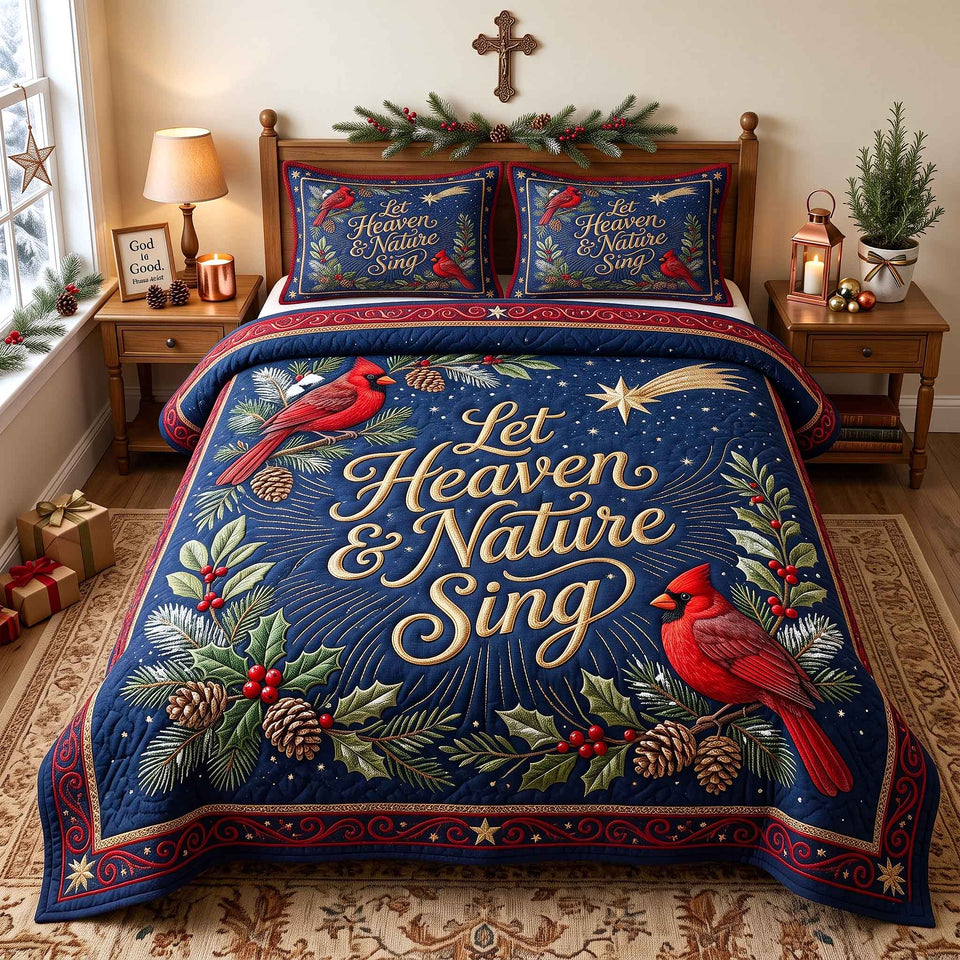 Heaven and Nature Sing quilted bedding set, quilt and two pillow shams on a made bed