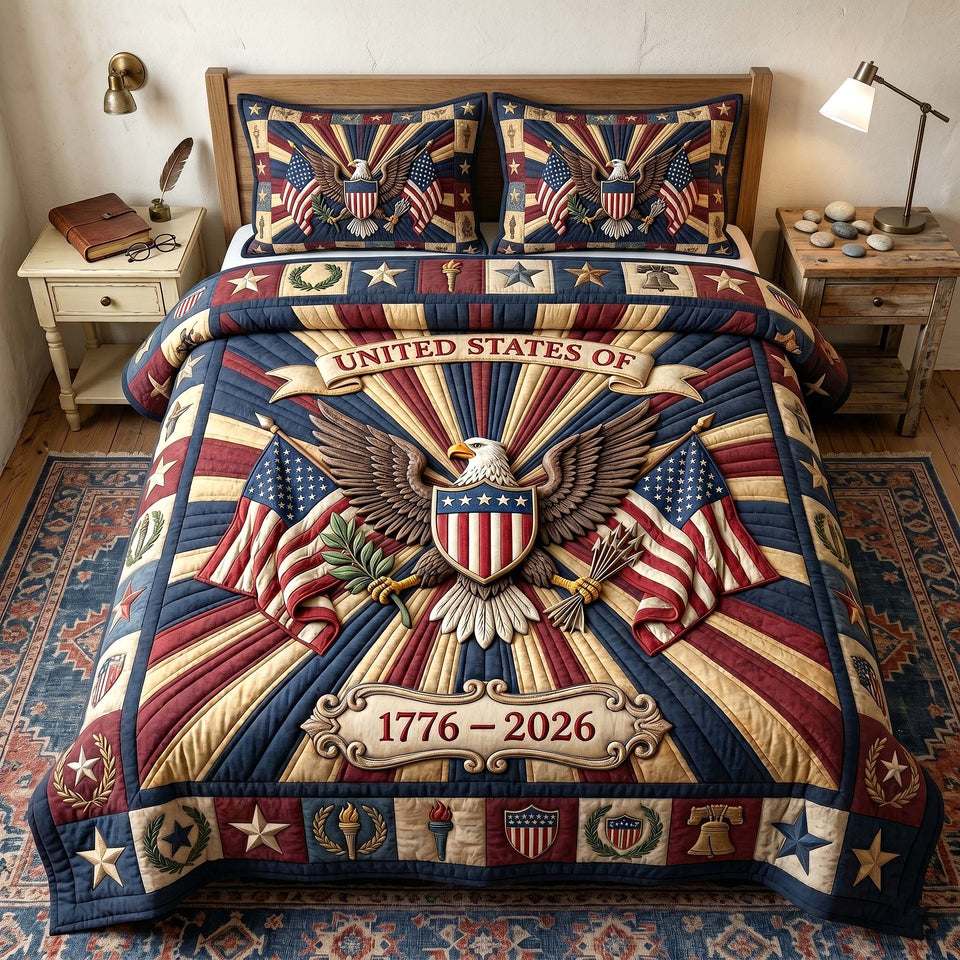 Heritage Patch Eagle quilted bedding set, quilt and two pillow shams on a made bed